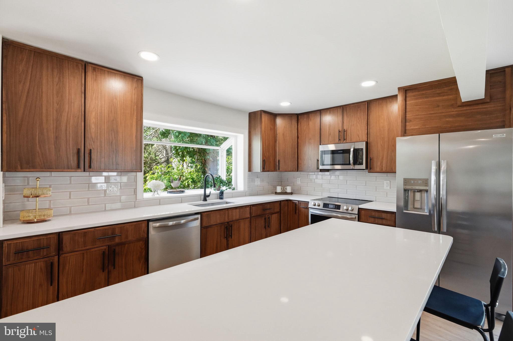 409 South Providence Road Wallingford, PA 19086 - Photo 35 of 106 Modern kitchen with natural light.