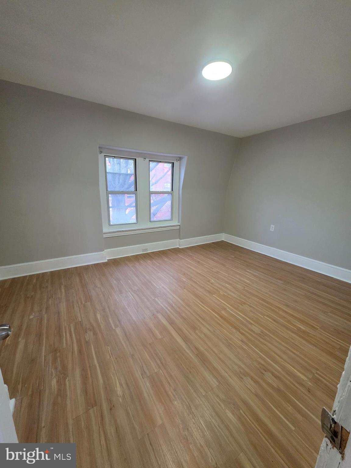 202 South 6th Street Reading, PA 19602 - Photo 11 of 11 an empty room with windows