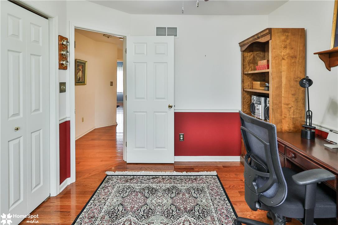 507 Howertown Road Northampton, PA 18067 - Photo 30 of 46 Refined wood flooring extends from this dedicated home office to the adjoining spaces.