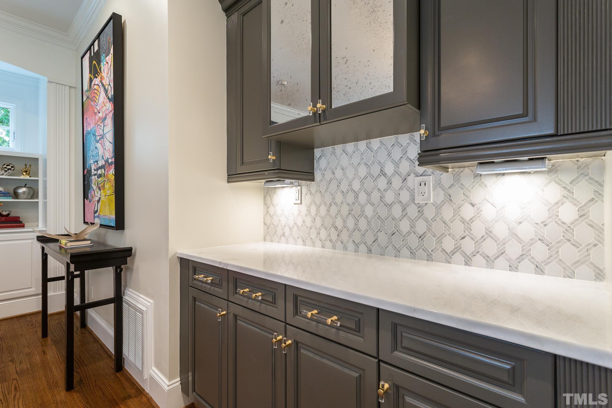 2505 Anderson Drive Raleigh, NC 27608 - Photo 12 of 30 a sink with a granite countertop window and cabinets