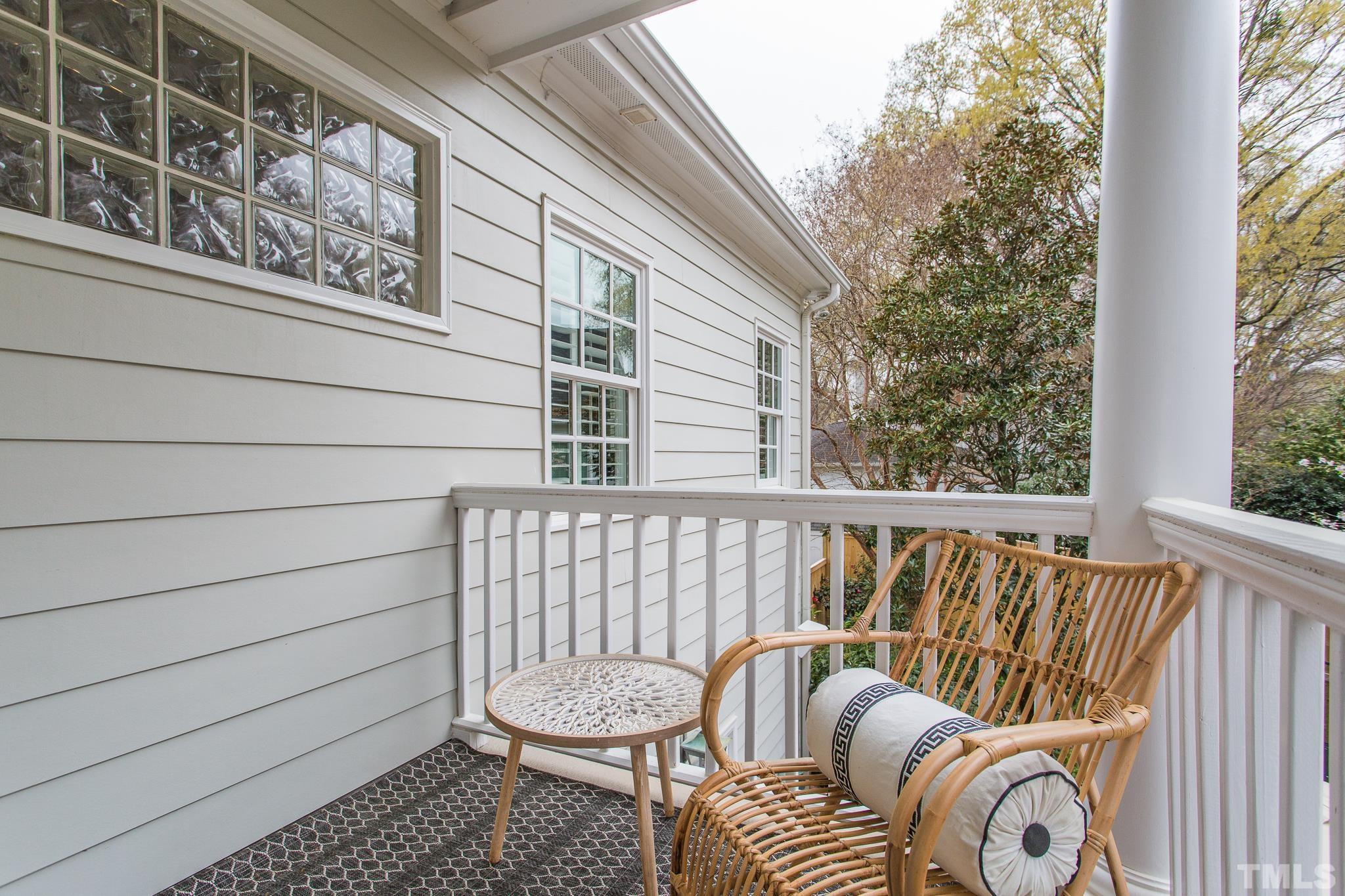2505 Anderson Drive Raleigh, NC 27608 - Photo 21 of 30 a view of a balcony with couch