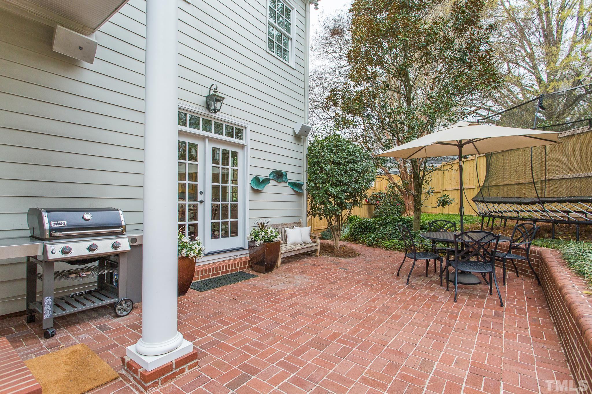 2505 Anderson Drive Raleigh, NC 27608 - Photo 26 of 30 a backyard of a house with outdoor seating
