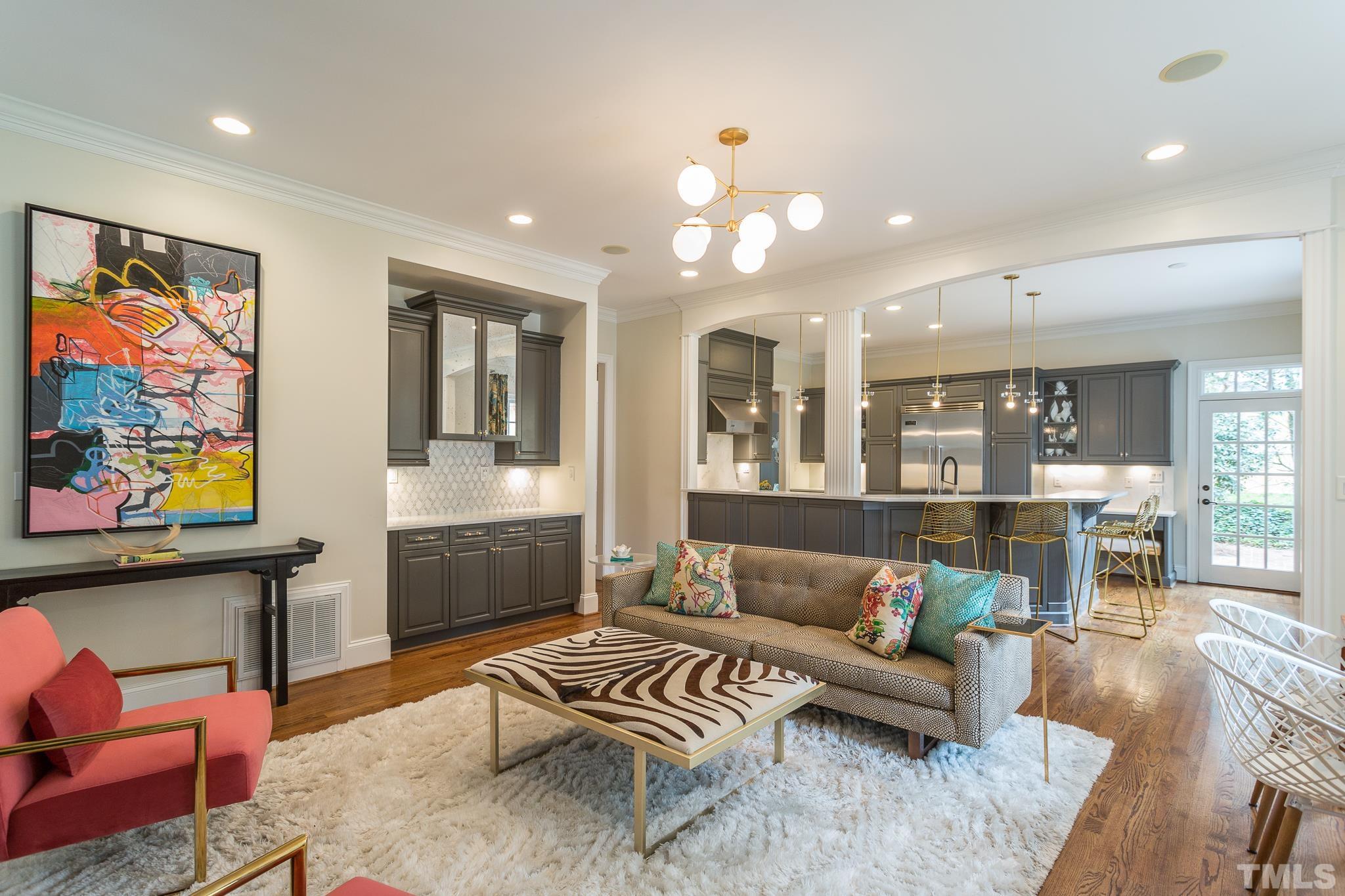 2505 Anderson Drive Raleigh, NC 27608 - Photo 7 of 30 a living room with furniture and a flat screen tv
