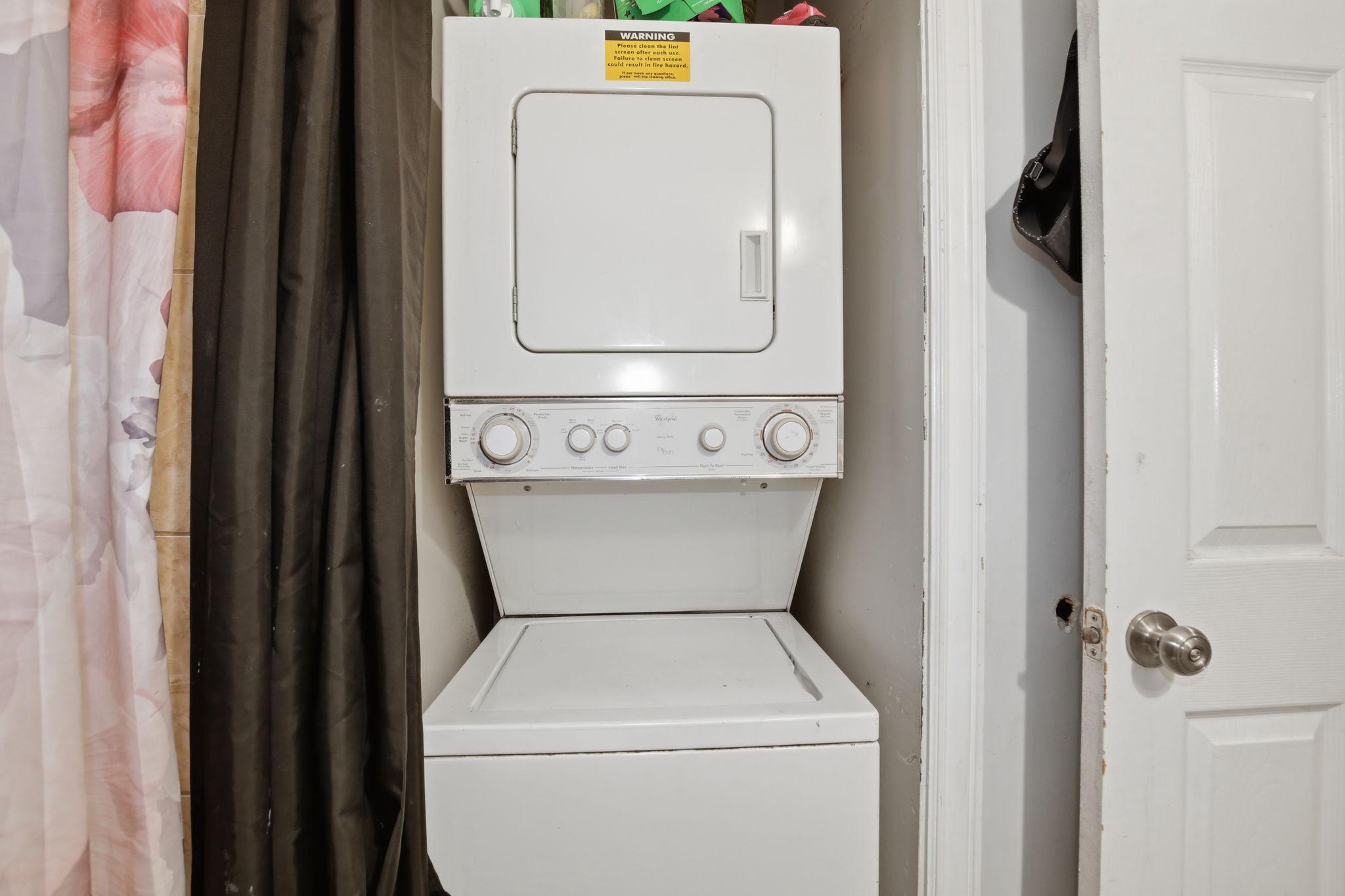 1101 Dutton Way Capitol Heights, MD 20743 - Photo 16 of 29 a utility room with dryer and washer