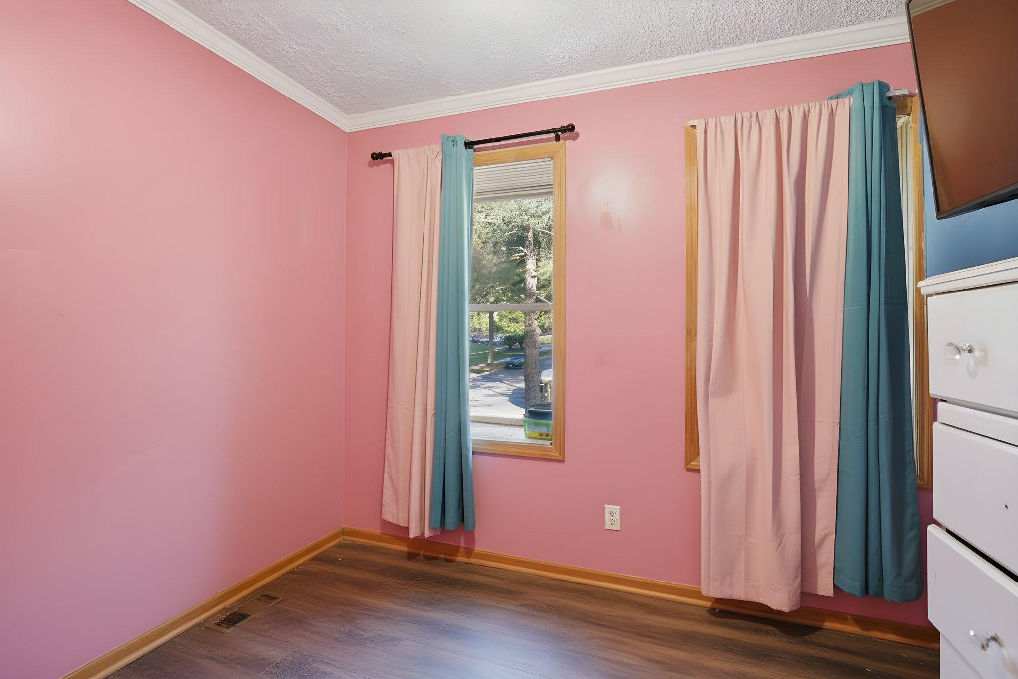 1101 Dutton Way Capitol Heights, MD 20743 - Photo 20 of 29 a view of a livingroom with wooden floor and a window
