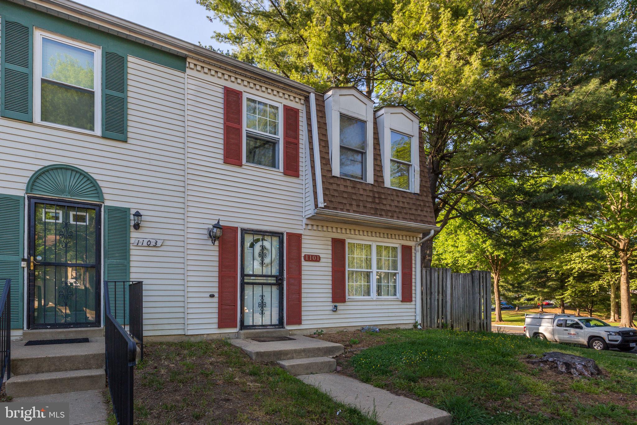 1101 Dutton Way Capitol Heights, MD 20743 - Photo 23 of 29 a front view of a house with garden