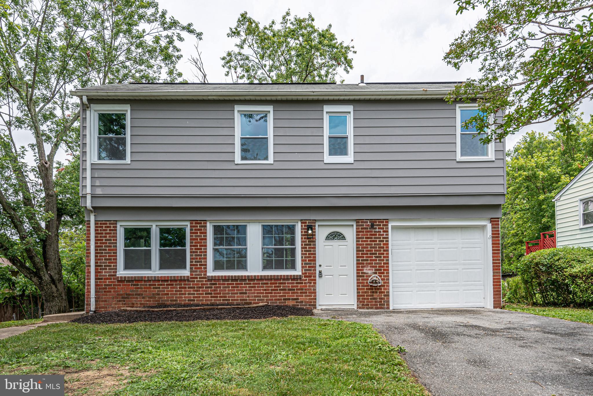 1852 Colmar Road Baltimore, MD 21207 - Photo 1 of 28 a view of house with front yard