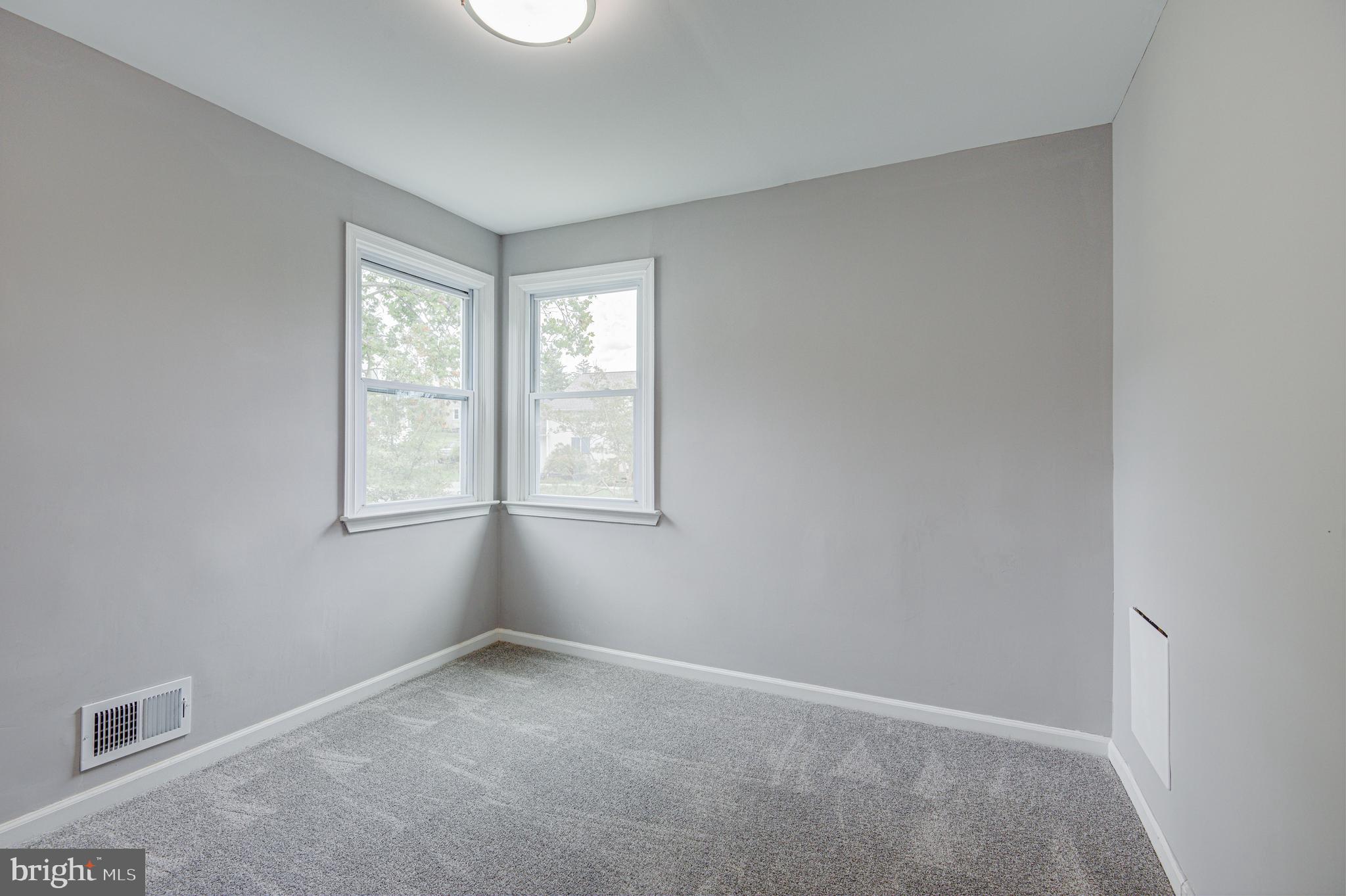 1852 Colmar Road Baltimore, MD 21207 - Photo 18 of 28 an empty room with windows