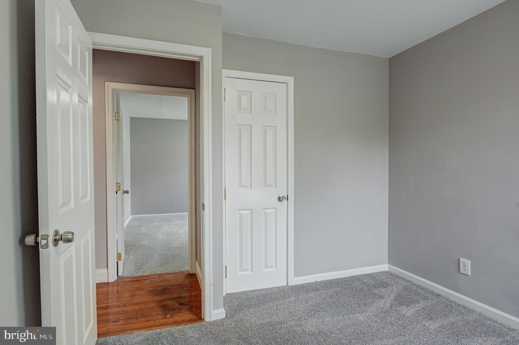 1852 Colmar Road Baltimore, MD 21207 - Photo 19 of 28 wooden floor and closet in a room