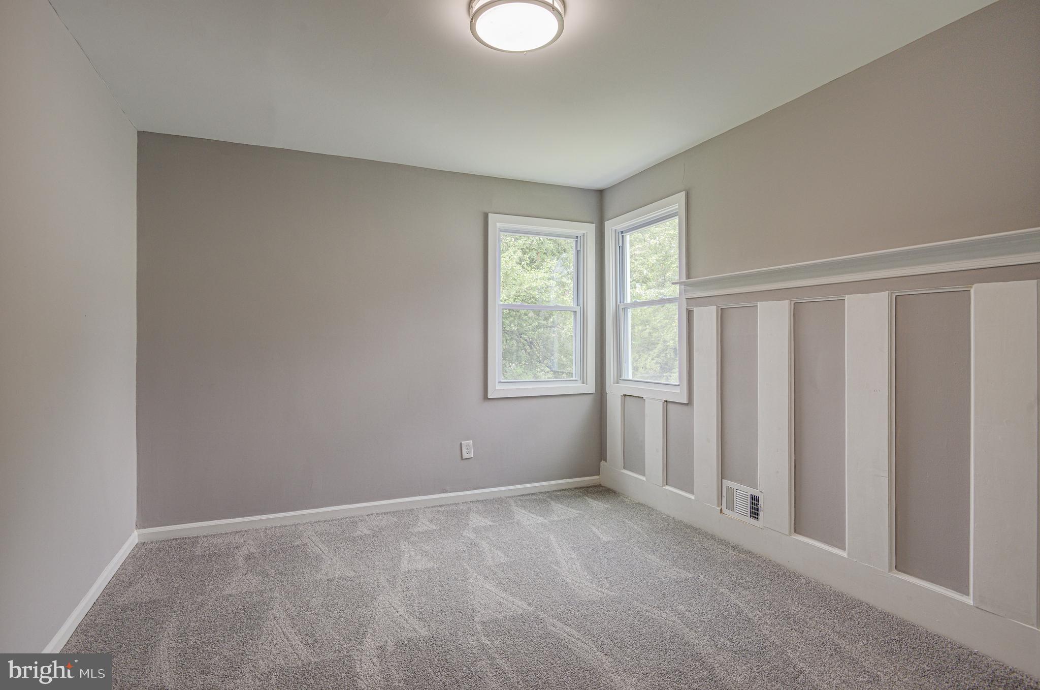 1852 Colmar Road Baltimore, MD 21207 - Photo 20 of 28 a view of an empty room with a window