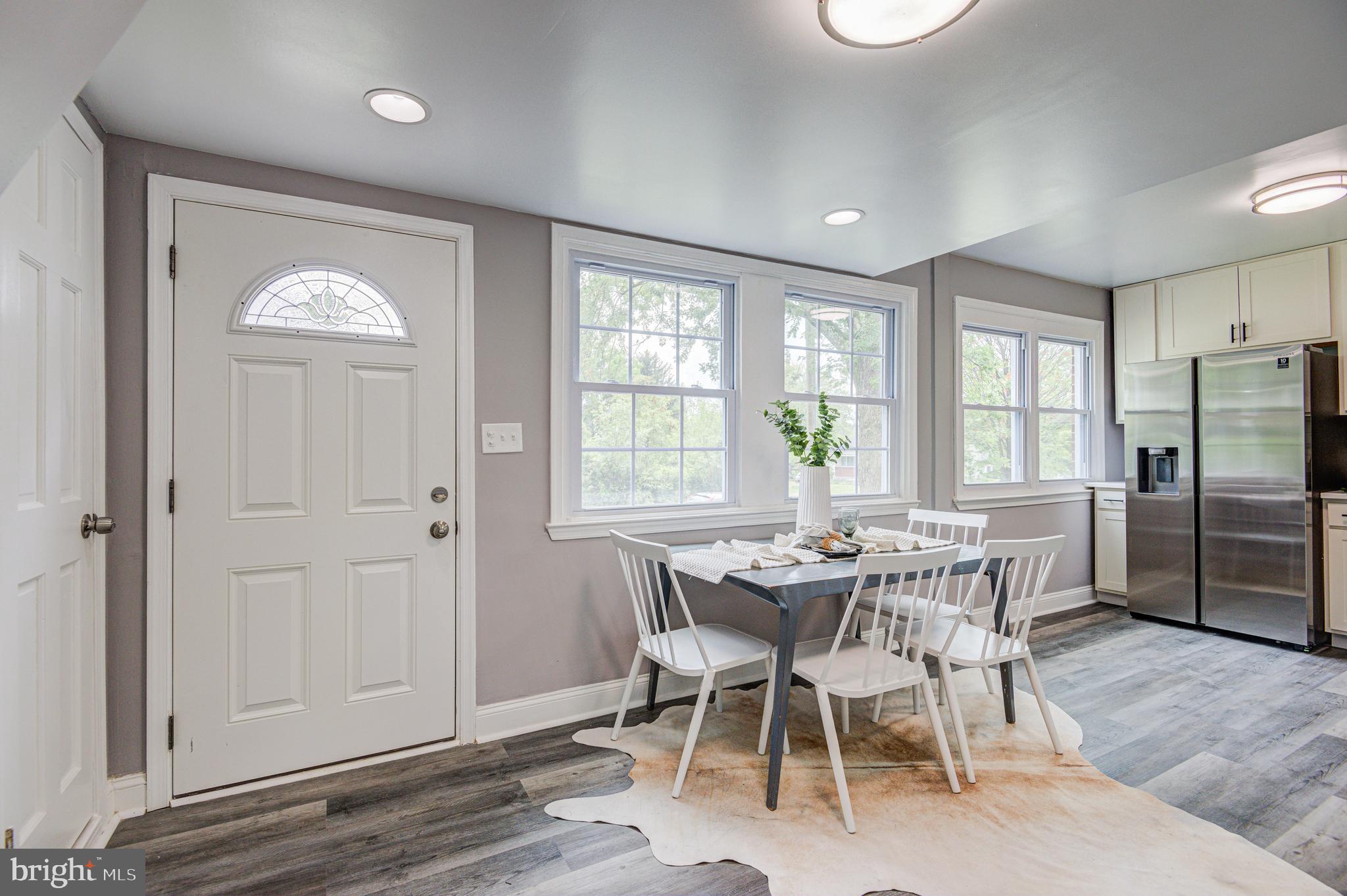1852 Colmar Road Baltimore, MD 21207 - Photo 3 of 28 a view of a dining room with furniture window and outside view