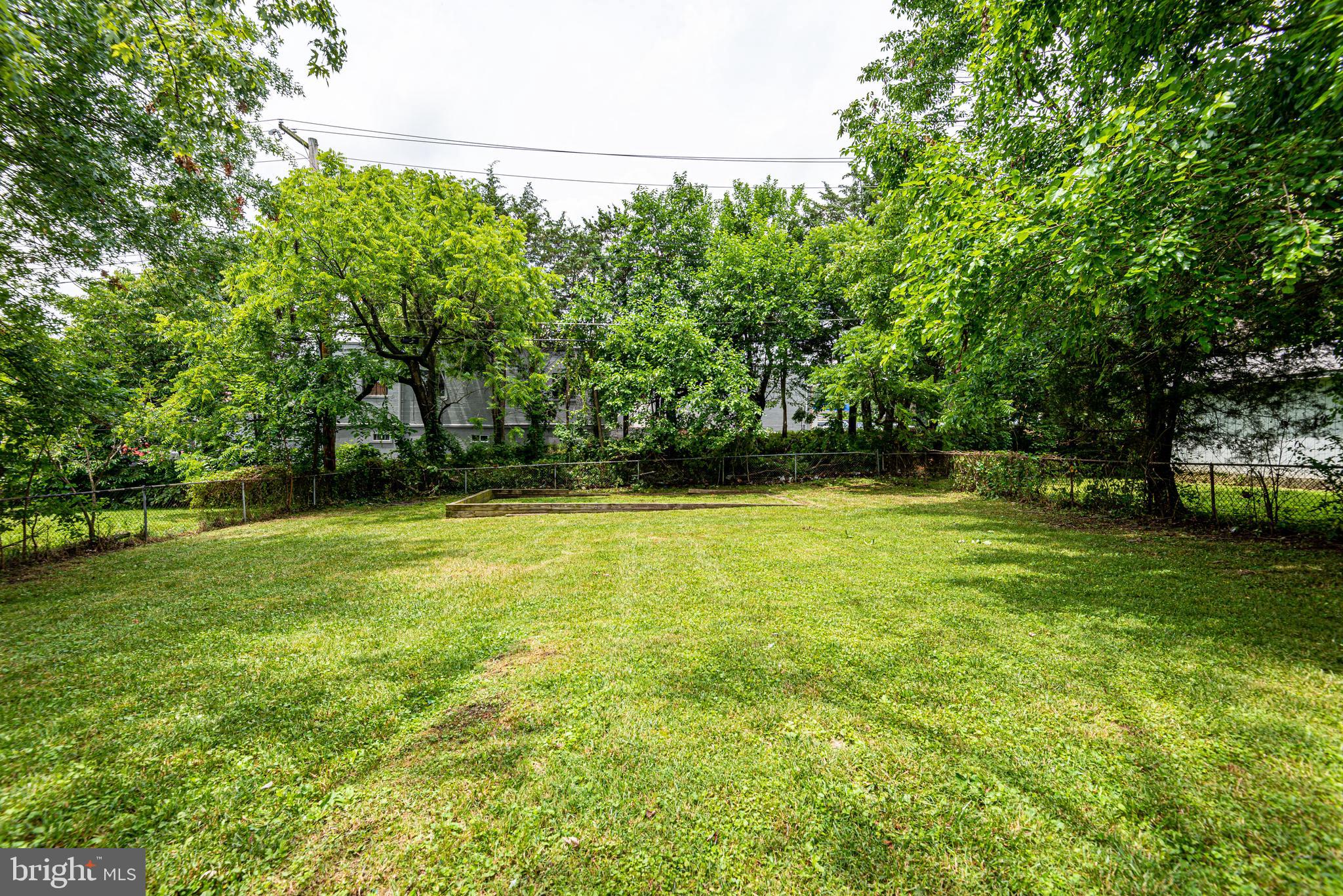 1852 Colmar Road Baltimore, MD 21207 - Photo 28 of 28 a view of outdoor space with deck and yard