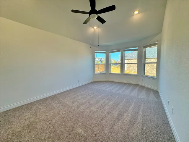 a kitchen with stainless steel appliances a stove top oven a sink a counter space and cabinets