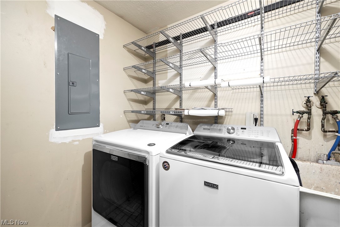 18042 Howe Road Strongsville, OH 44136 - Photo 9 of 35 Clothes washing area featuring independent washer and dryer