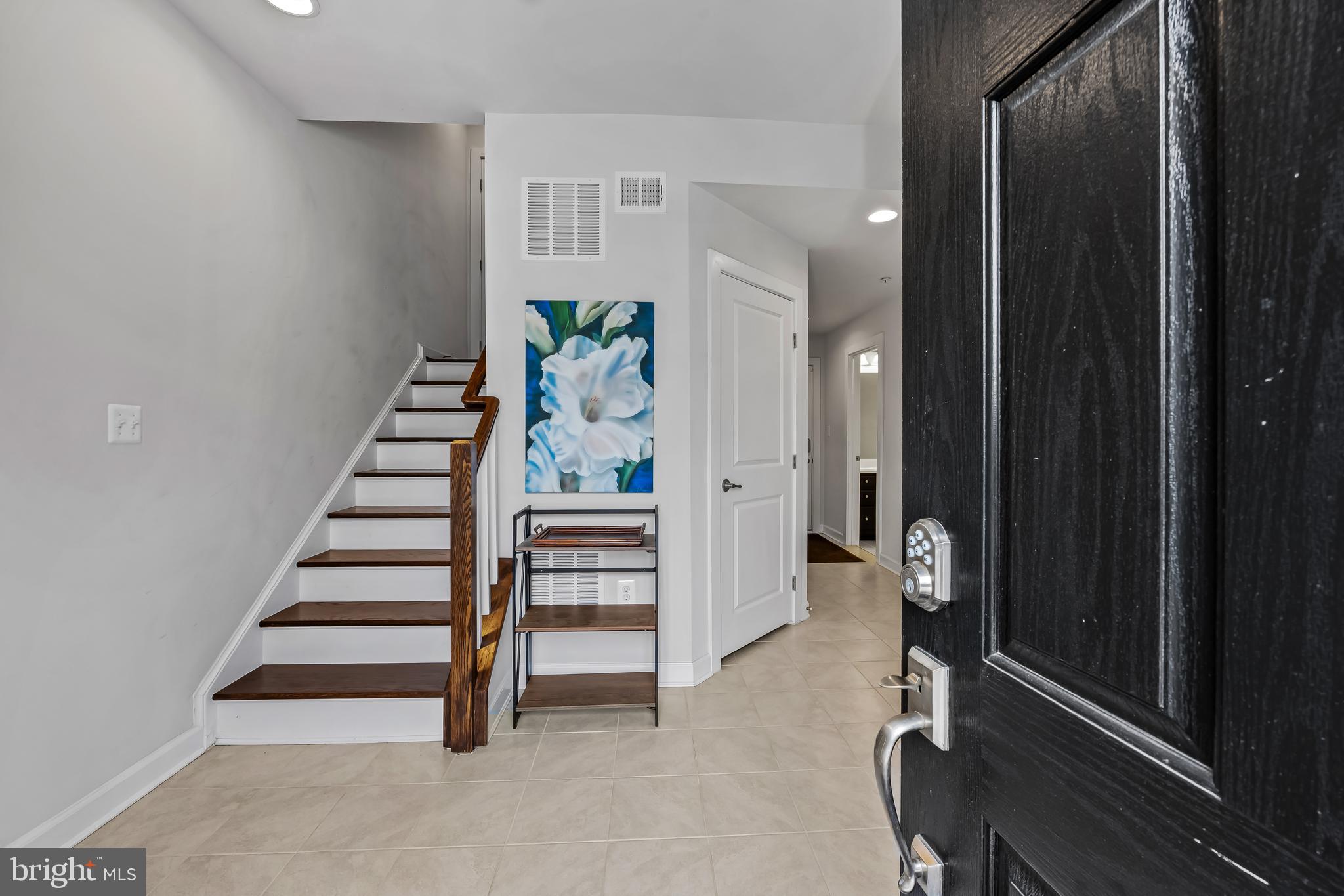 34 Wedge Way, Unit 10 Pikesville, MD 21208 - Photo 2 of 48 Main level entry; adjacent bedroom and full bath