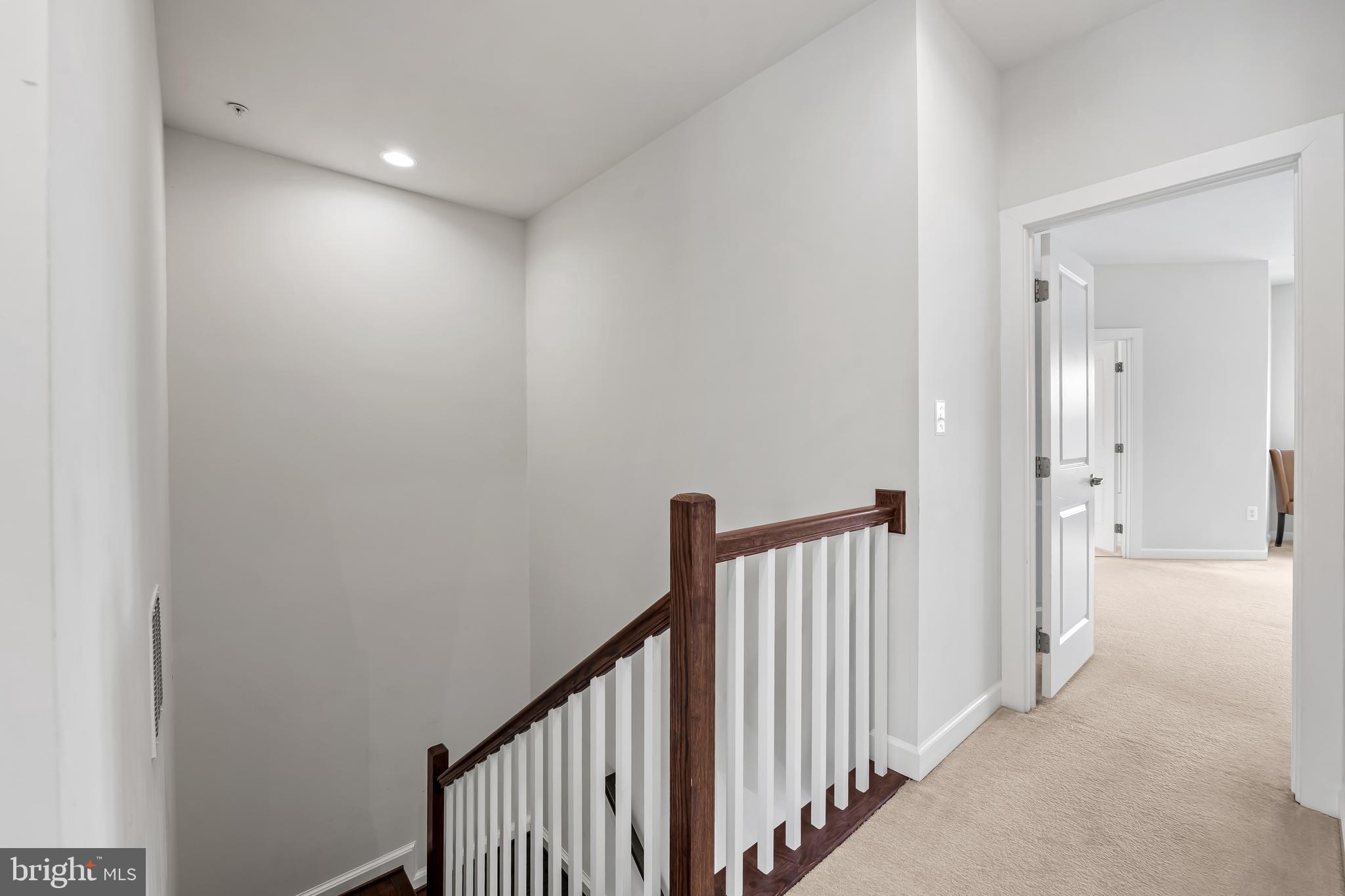 34 Wedge Way, Unit 10 Pikesville, MD 21208 - Photo 27 of 48 Staircase to third level