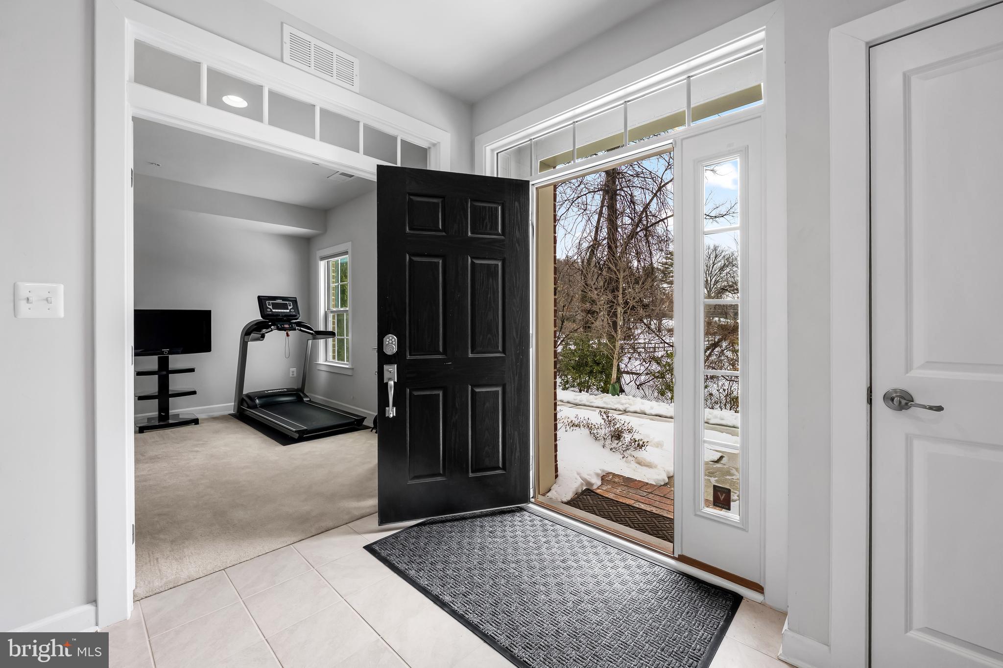 34 Wedge Way, Unit 10 Pikesville, MD 21208 - Photo 3 of 48 Transom window & sidelights; view to green space