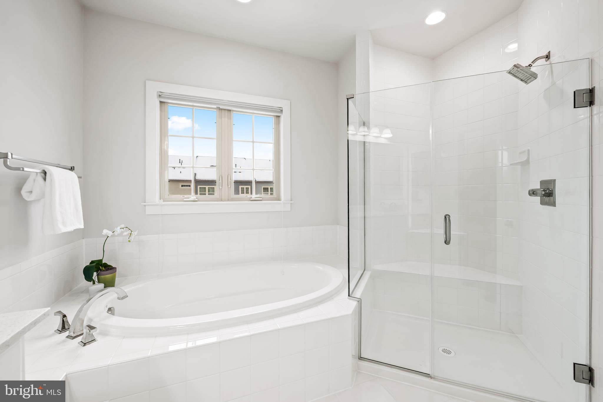34 Wedge Way, Unit 10 Pikesville, MD 21208 - Photo 33 of 48 Soaking tub; walk-in shower w/custom glass doors