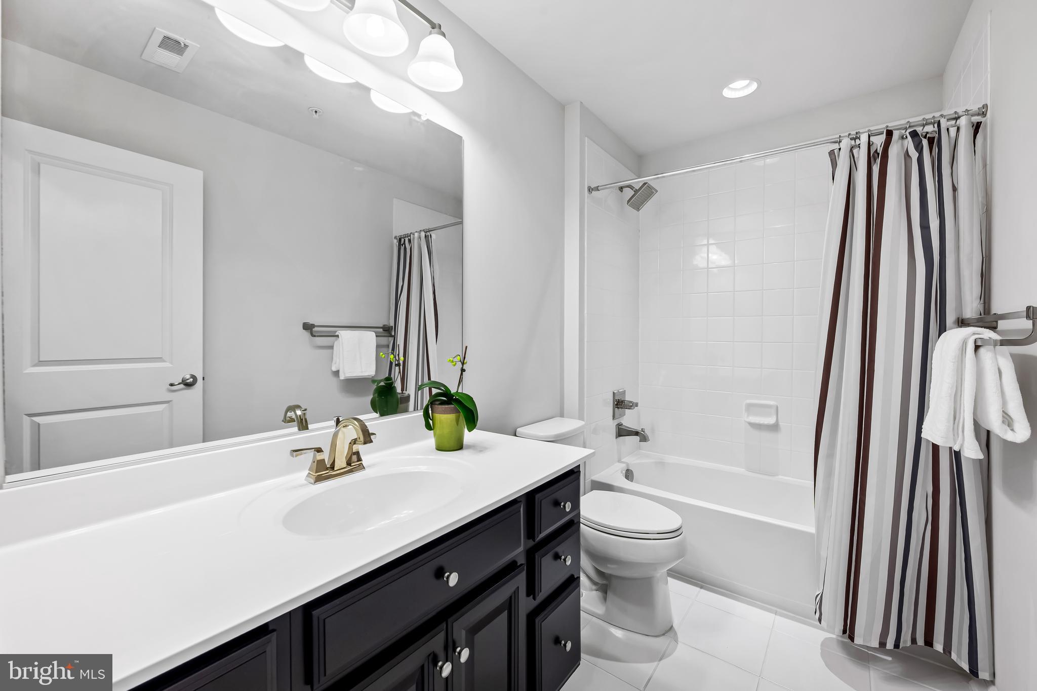 34 Wedge Way, Unit 10 Pikesville, MD 21208 - Photo 6 of 48 Main level full bath 1