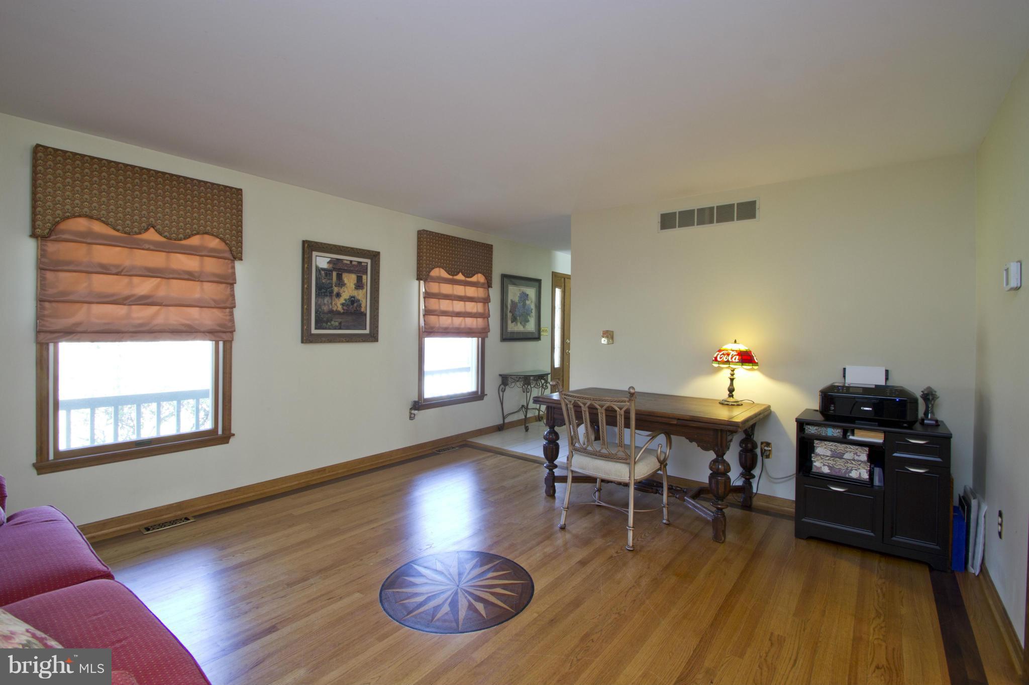 415 Magothy Bridge Road Pasadena, MD 21122 - Photo 8 of 30 HARDWOODS IN FORMAL LIVING ROOM
