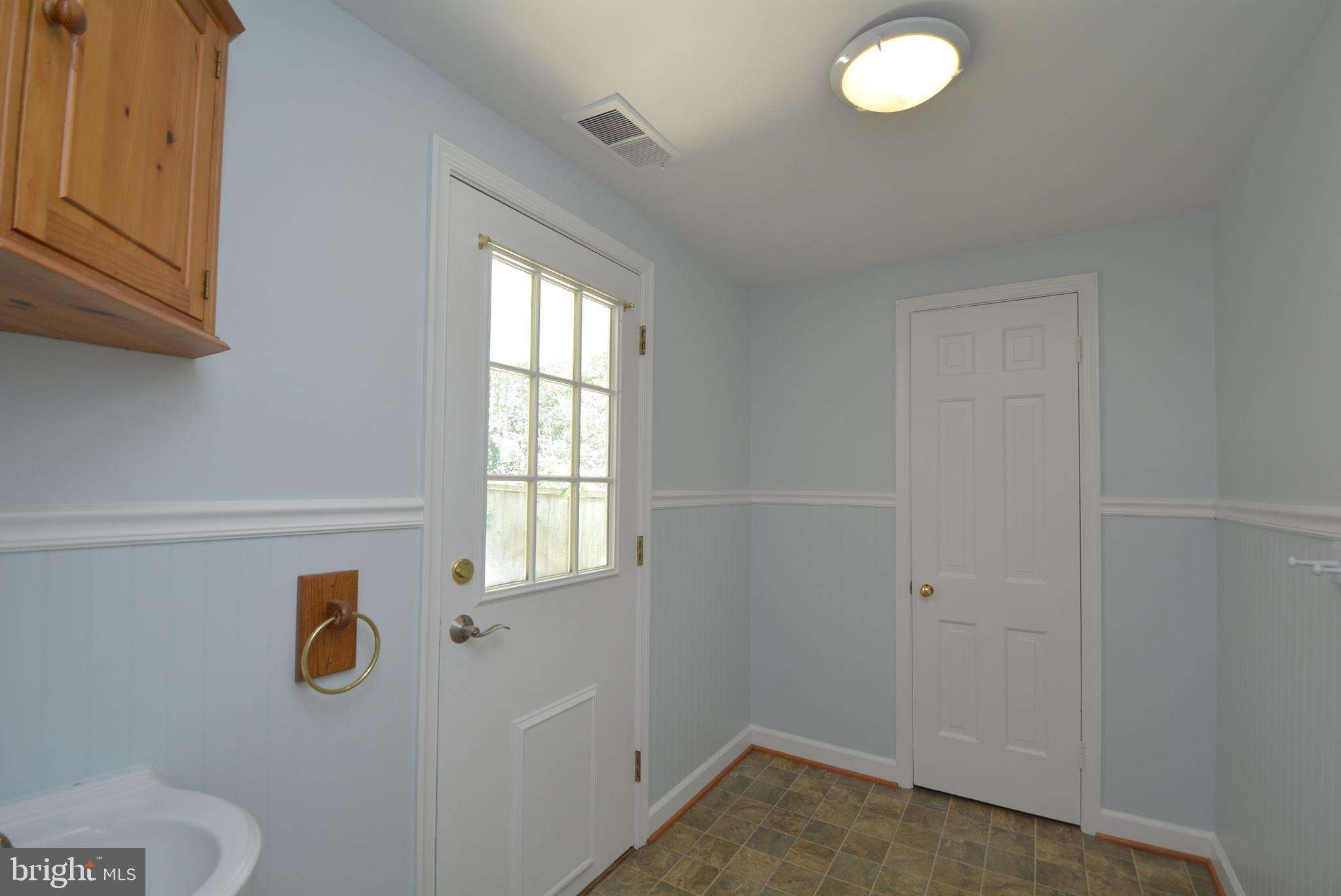 8709 Highgate Road Alexandria, VA 22308 - Photo 20 of 58 Mudroom for access to the yard