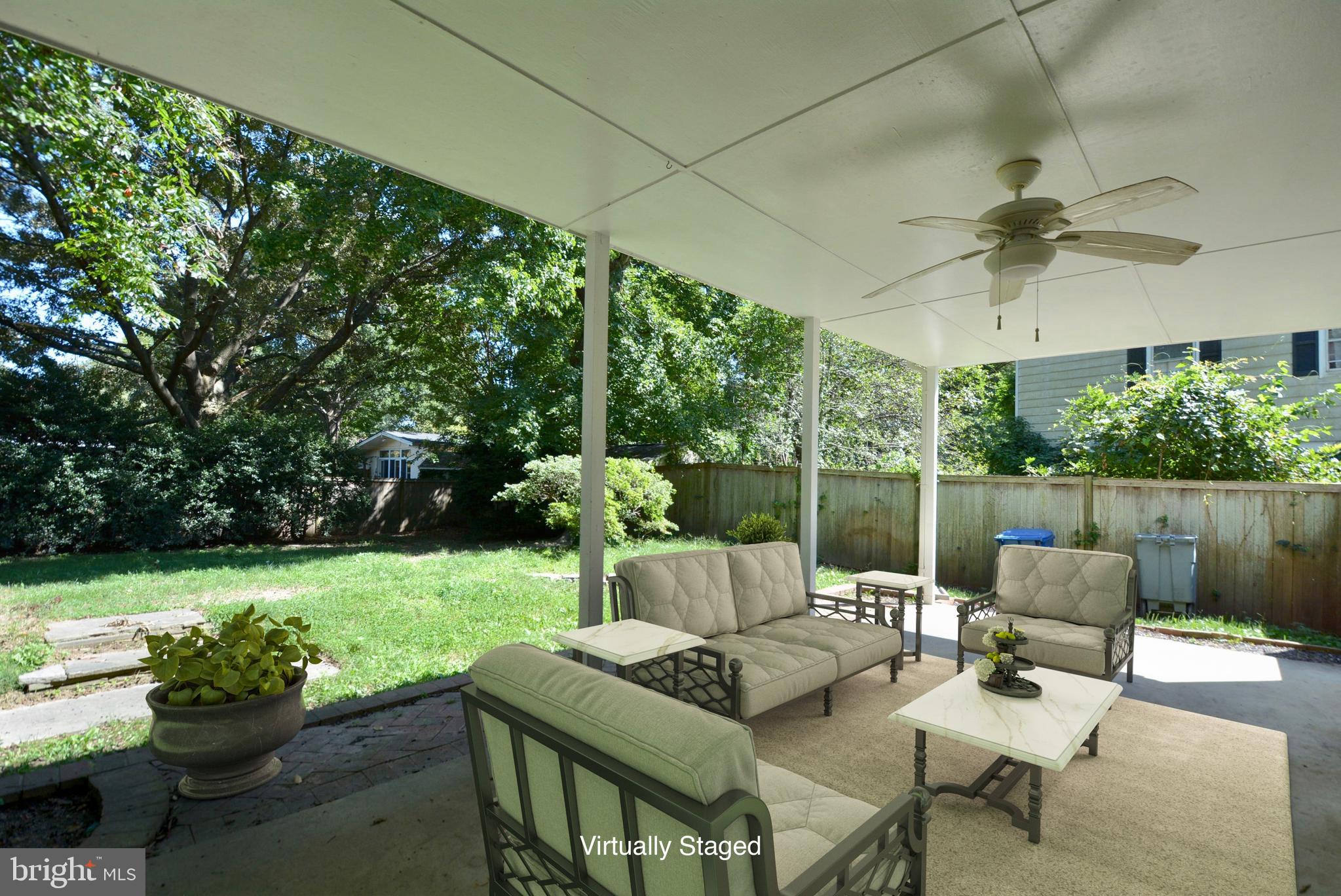 8709 Highgate Road Alexandria, VA 22308 - Photo 3 of 58 Covered patio, view of flat, fenced lot