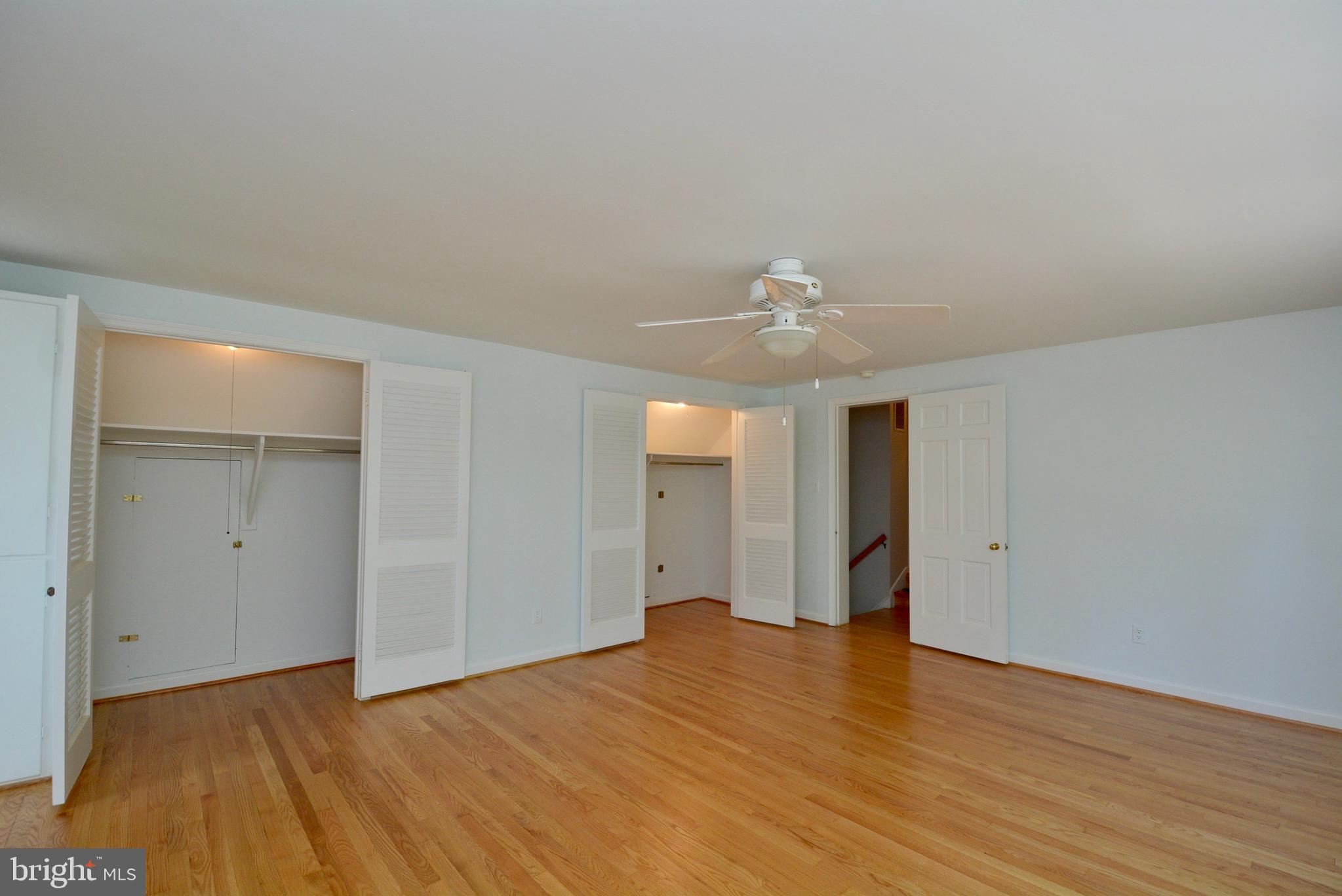 8709 Highgate Road Alexandria, VA 22308 - Photo 25 of 58 Two closets in the primary bedroom