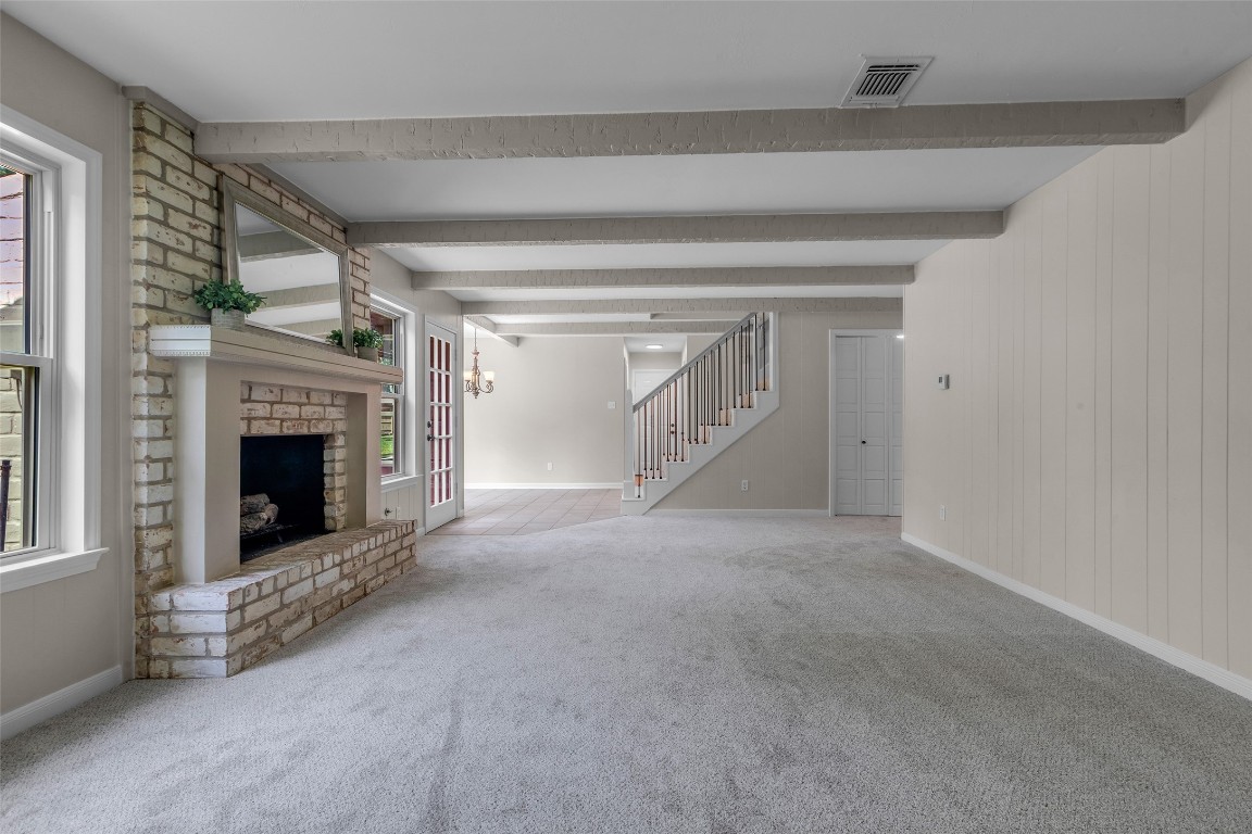 6415 Bayonne Drive Spring, TX 77389 - Photo 22 of 40 a view of a livingroom with an empty space and a fireplace
