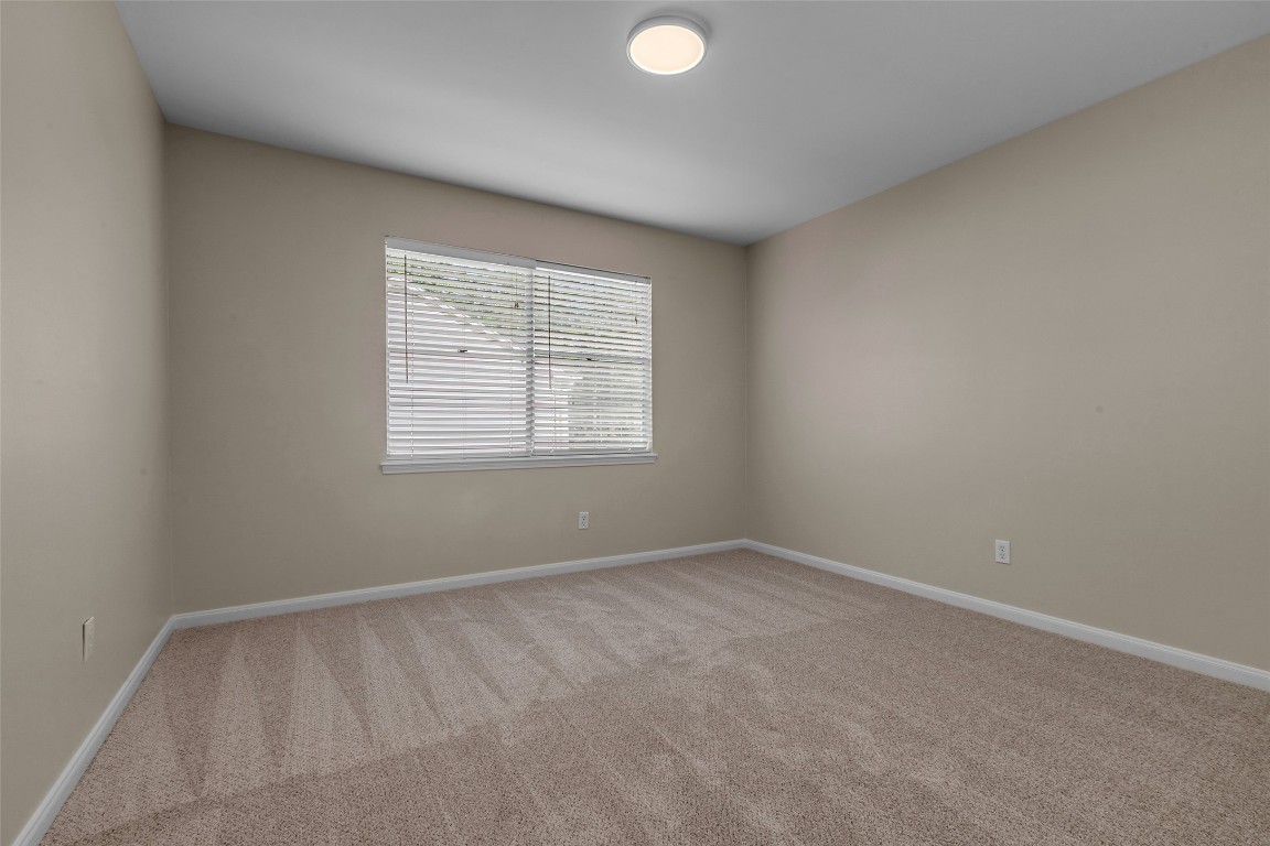 6415 Bayonne Drive Spring, TX 77389 - Photo 30 of 40 an empty room with a window