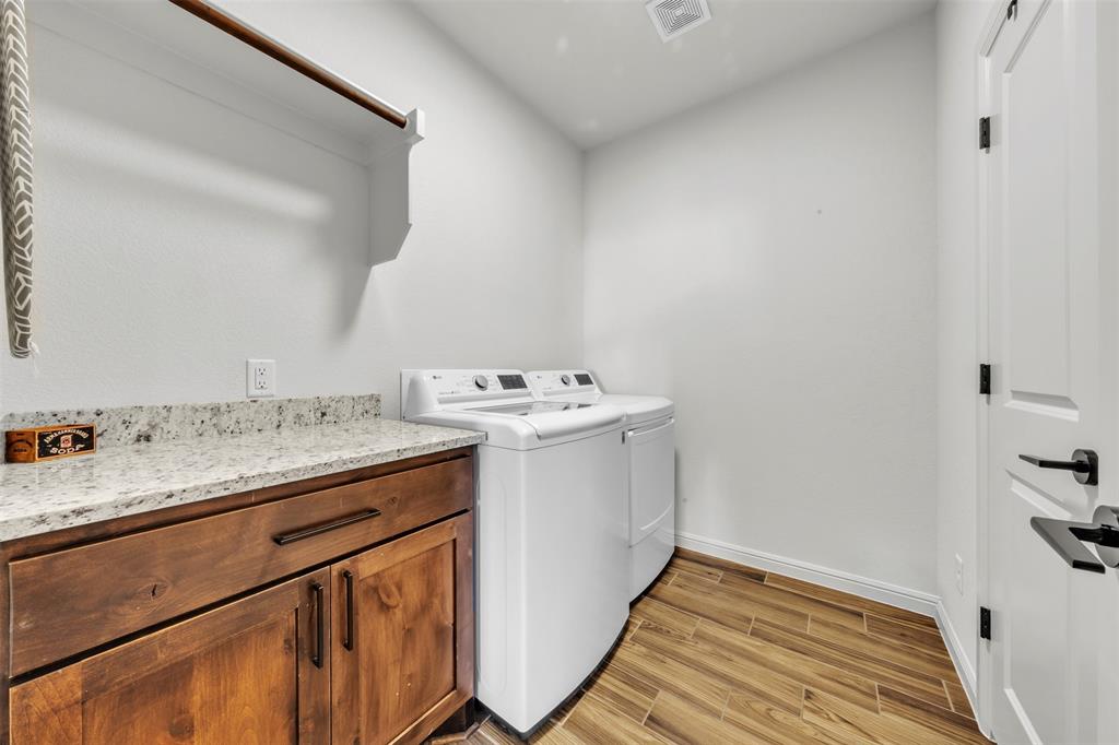 6632 Buffalo Ridge Circle Godley, TX 76044 - Photo 14 of 37 a utility room with sink washer and dryer