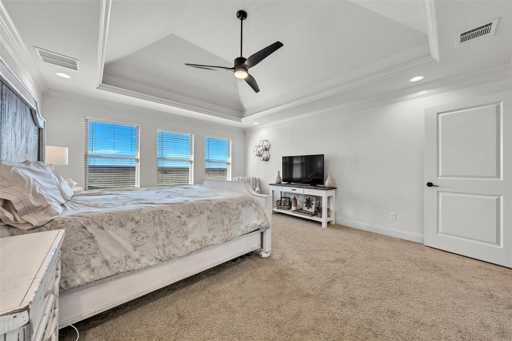6632 Buffalo Ridge Circle Godley, TX 76044 - Photo 16 of 37 a living room with furniture and a flat screen tv