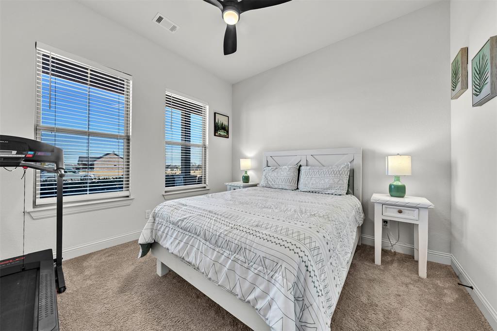 6632 Buffalo Ridge Circle Godley, TX 76044 - Photo 23 of 37 a bedroom with bed and window