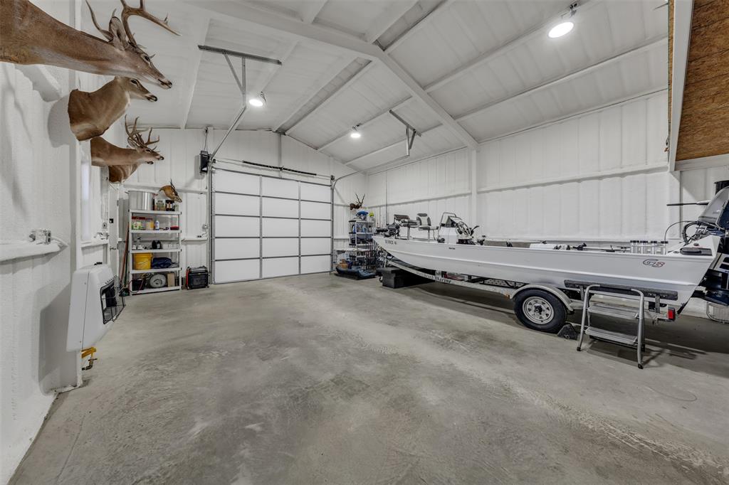 6632 Buffalo Ridge Circle Godley, TX 76044 - Photo 32 of 37 a view of a garage with furniture