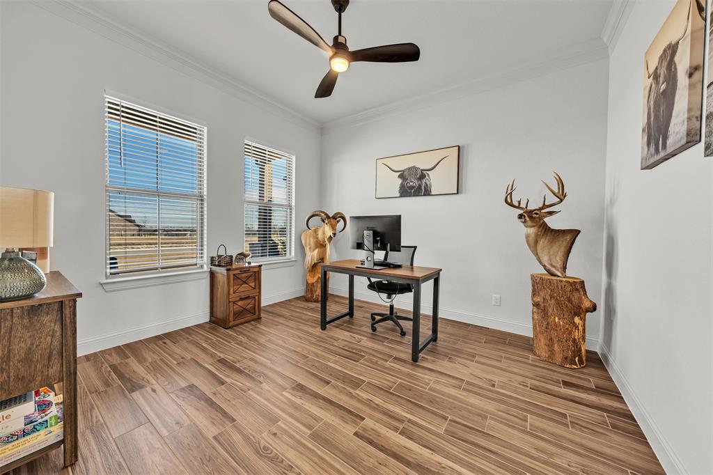 6632 Buffalo Ridge Circle Godley, TX 76044 - Photo 6 of 37 a living room with furniture a window and a flat screen tv