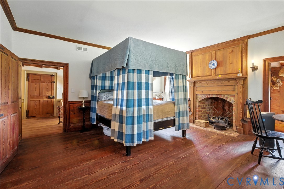 11826 Colonial Trail West Spring Grove, VA 23881 - Photo 15 of 42 a living room with furniture and a fireplace