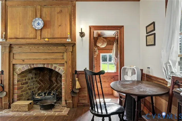 a bedroom with furniture and a chair