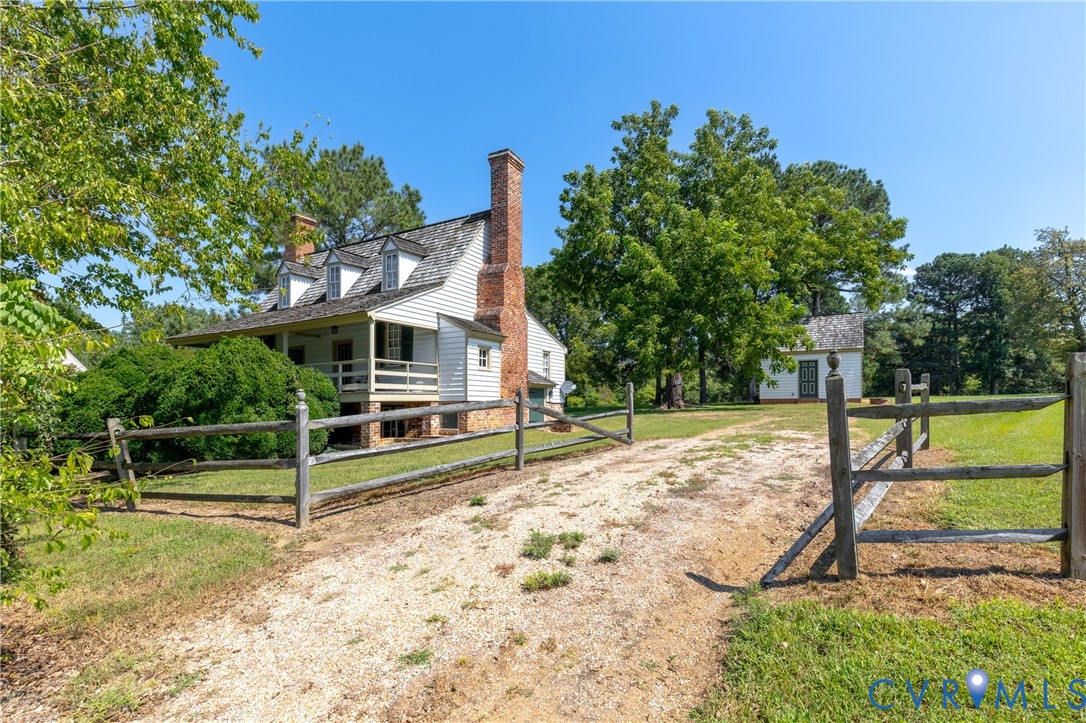 11826 Colonial Trail West Spring Grove, VA 23881 - Photo 2 of 42 a view of a house with a yard