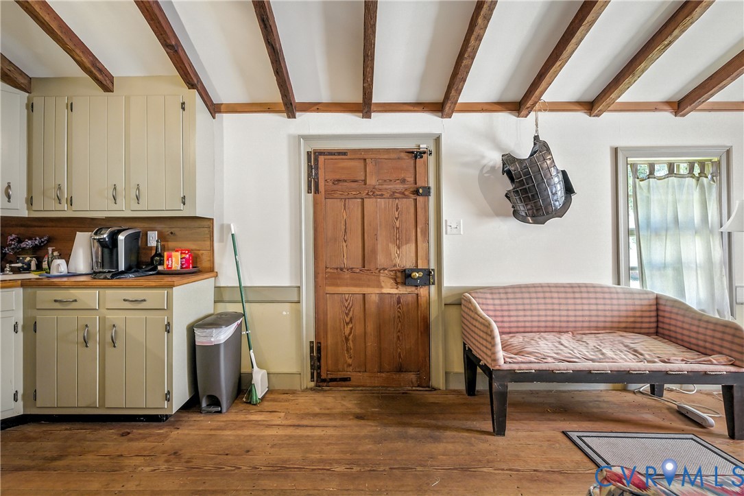 11826 Colonial Trail West Spring Grove, VA 23881 - Photo 25 of 42 a kitchen with a refrigerator and cabinets