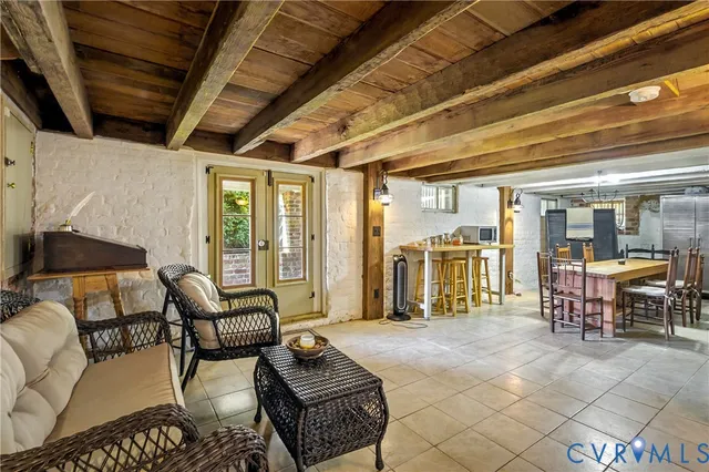 a view of a kitchen with furniture and a kitchen