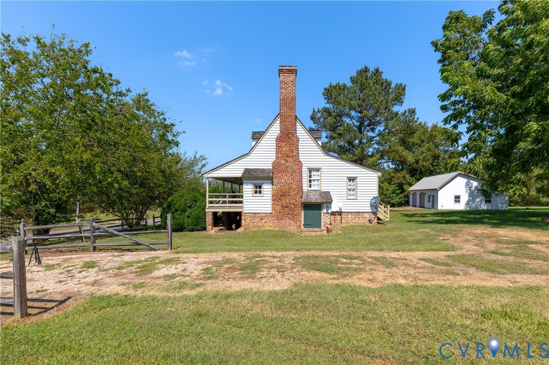 11826 Colonial Trail West Spring Grove, VA 23881 - Photo 39 of 42 a view of a house with a yard