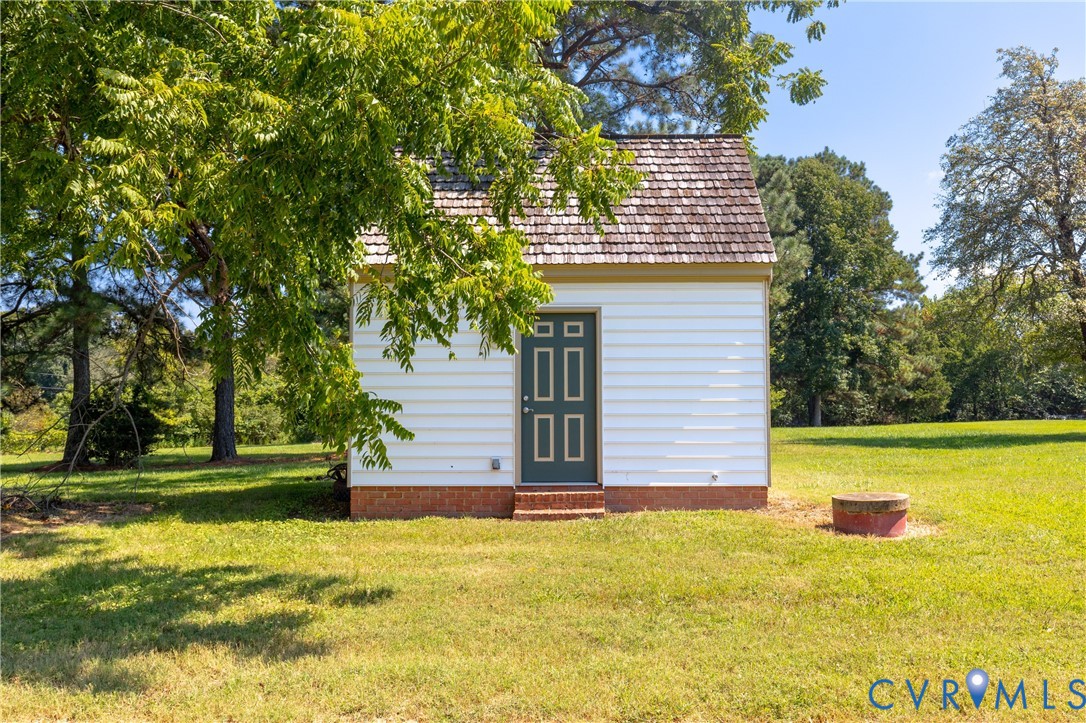 11826 Colonial Trail West Spring Grove, VA 23881 - Photo 41 of 42 a view of a house with a yard