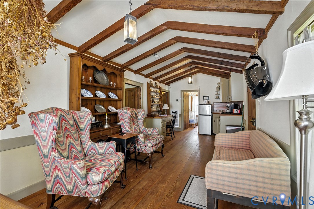 11826 Colonial Trail West Spring Grove, VA 23881 - Photo 5 of 42 a living room with furniture and wooden floor