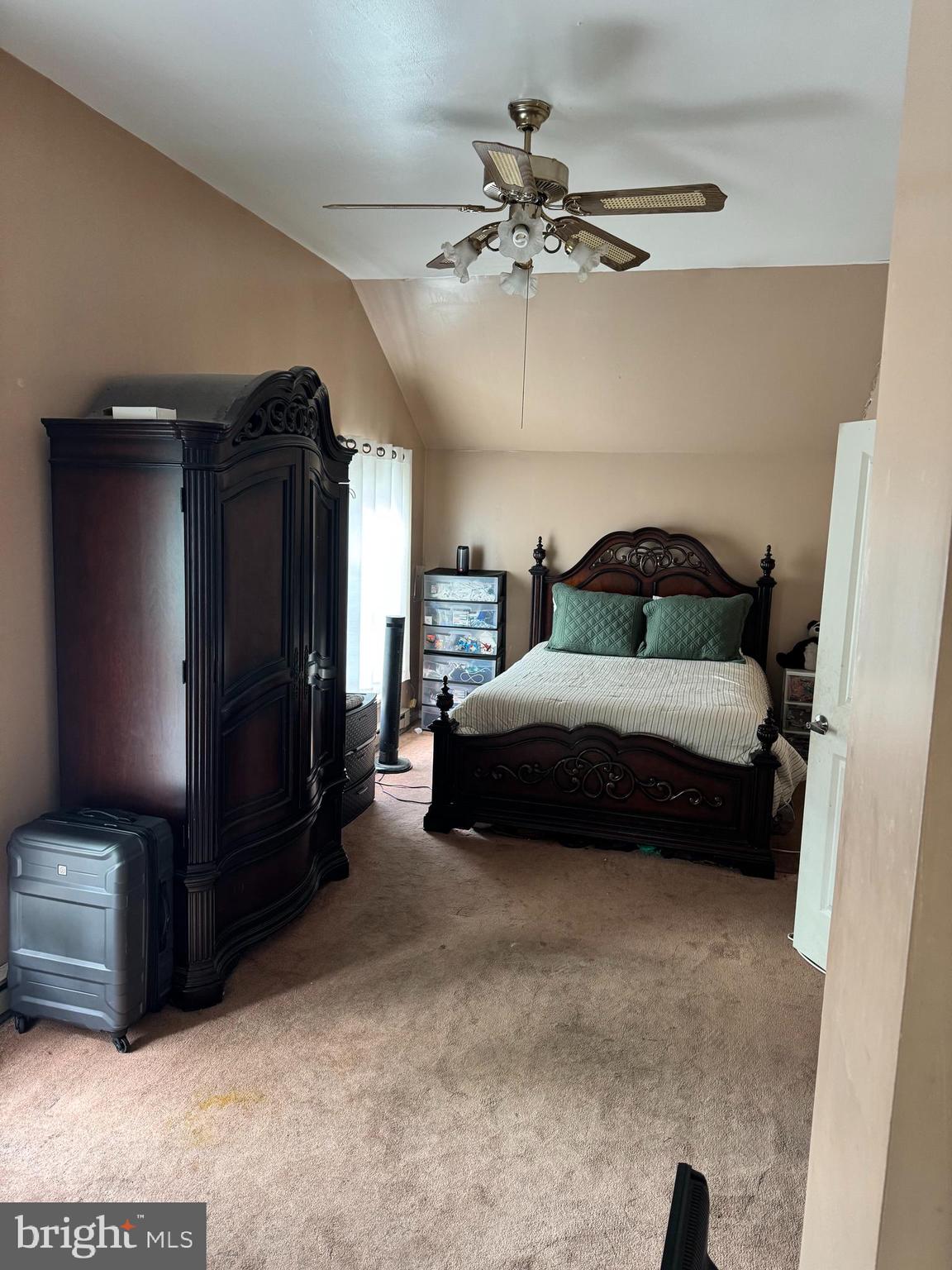 461 Old Erial Road Sicklerville, NJ 08081 - Photo 8 of 34 a bedroom with a bed and a chandelier