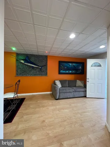 a view of a projector room with a couch