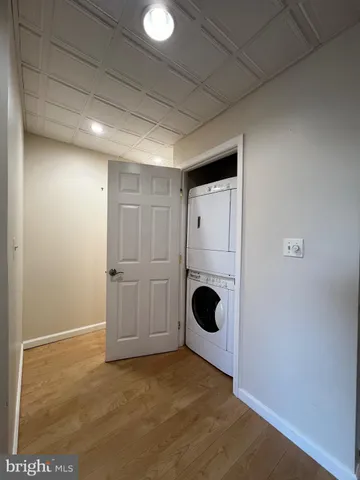 a view of a storage & utility room with washer and dryer