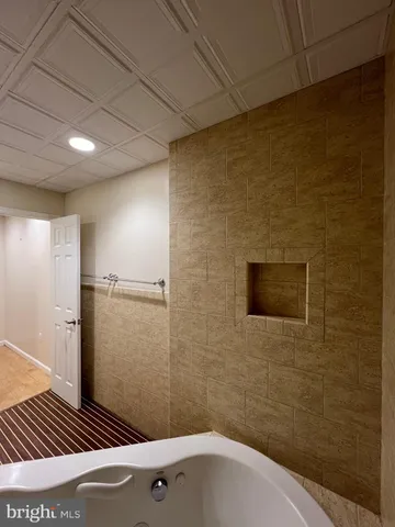 a bathroom with a sink and a shower