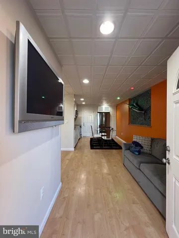 a view of a living room hardwood floor