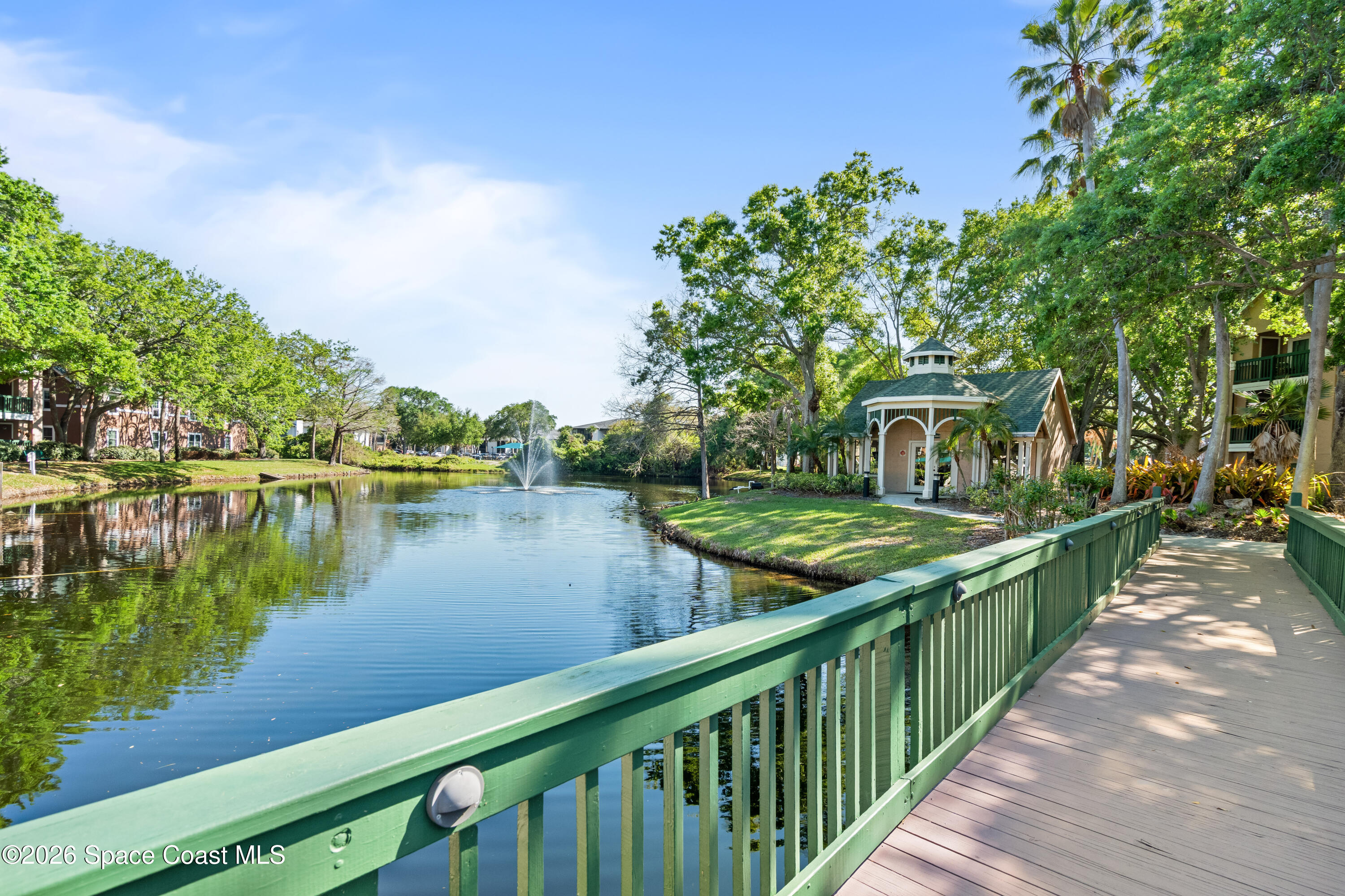7667 North Wickham Road, Unit 208 Melbourne, FL 32940 - Photo 32 of 33 a view of a wooden bridge