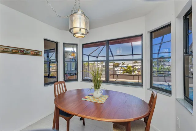 a bedroom with a large bed and a couch