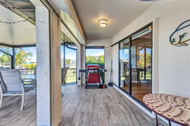 a view of a swimming pool with a patio